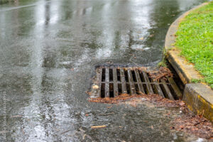 a drain in the middle of a street