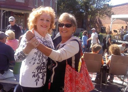 a couple of women standing next to each other