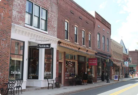 a row of buildings on a city street
