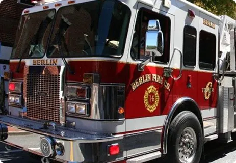 a fire truck parked on the side of the road
